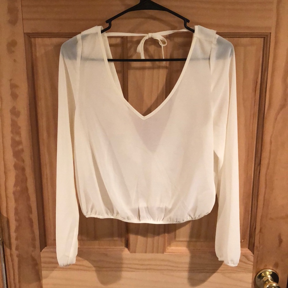 Sheer cream top
